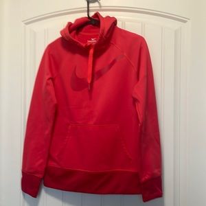 Nike Therma-Fit red hoodie.